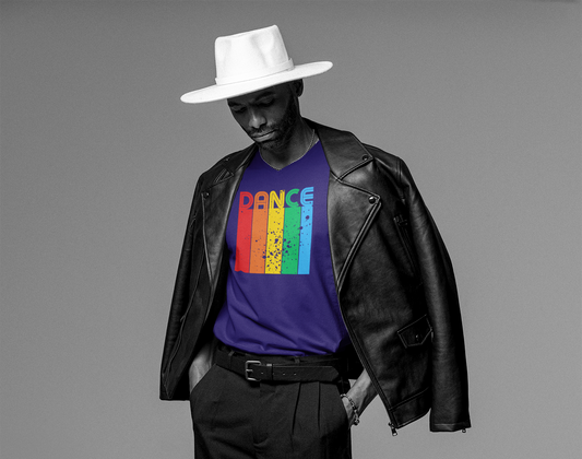 A male wearing a purple dance tshirt with the text "Dance". Each letter has a unique color and sits on top of a column with the same color
