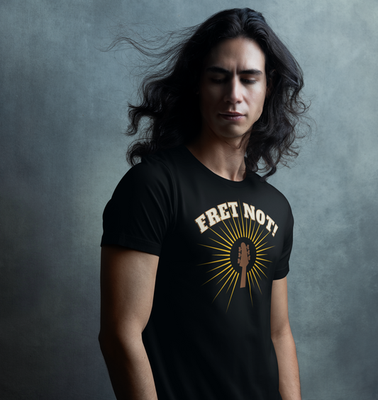 A black music tshirt design with the text "fret not" and a halo around a guitar. It's a funny tshirt for guitarrists
