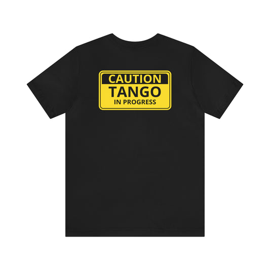 An argentine tango dance tshirt with the text "Caution Tango in progress" written on a yellow warning sign. A funny tshirt for tango dancers!