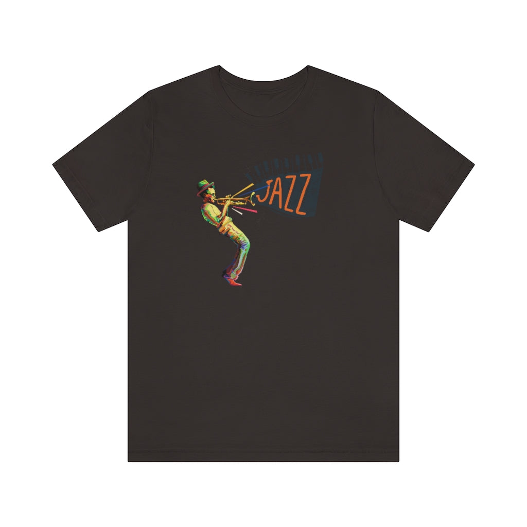 A jazz music tshirt with the text "Jazz" coming out from a trumpet players instrument. The trumpet player is colored in vivid colors