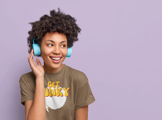 Dancer wearing headphones and wearing a funny music tshirt with the word "get funky"