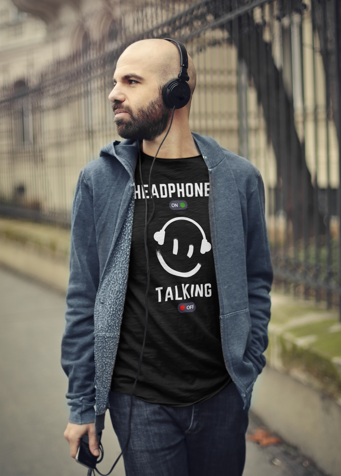 A music tshirt design with the text "headphones one talking off". A comical tshirt for introverts