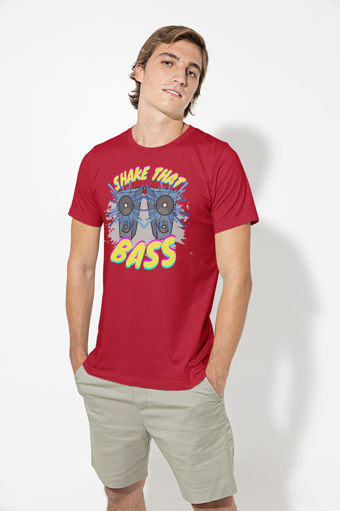 A music tshirt for bassheads and bass lovers. It has the text "shake that bass" and graphics of two really loud speakers