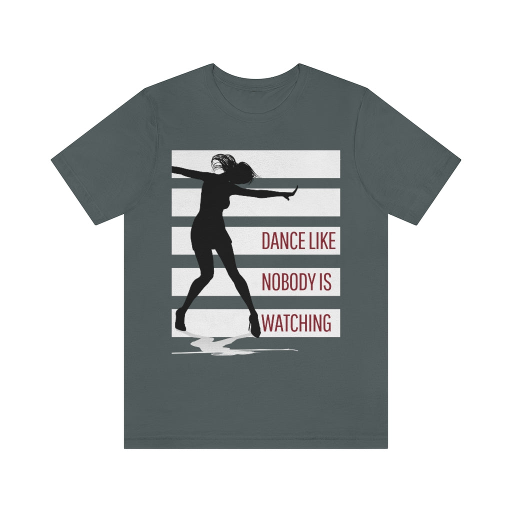 A grey t shirt with white stripes and a dancer in silhouette. It has the text "dance like nobody is watching".
