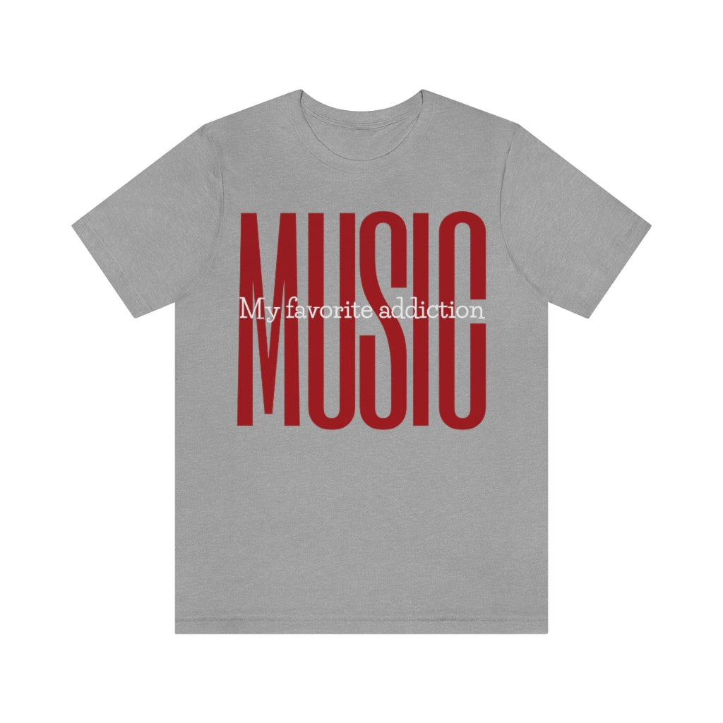 A light grey A green T-shirt with large red and bold text saying "MUSIC". In the middle of it is the white text "My favorite addiction".