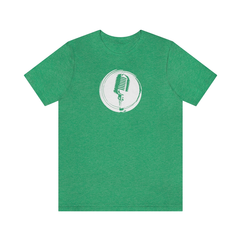 A green T-shirt with a vintage microphone on a retro stylized circle.