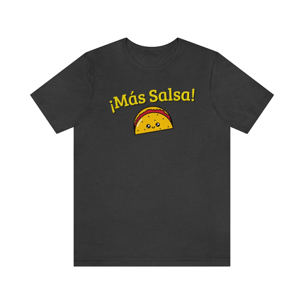 A dark grey T-shirt with the text "Más Salsa!" and with a kawaii taco being happy.
