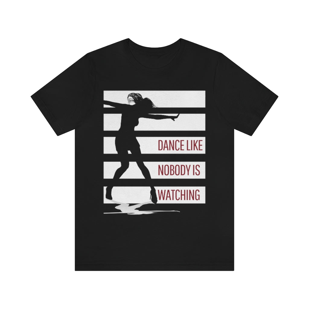 A black t shirt with white stripes and a dancer in silhouette. It has the text "dance like nobody is watching".
