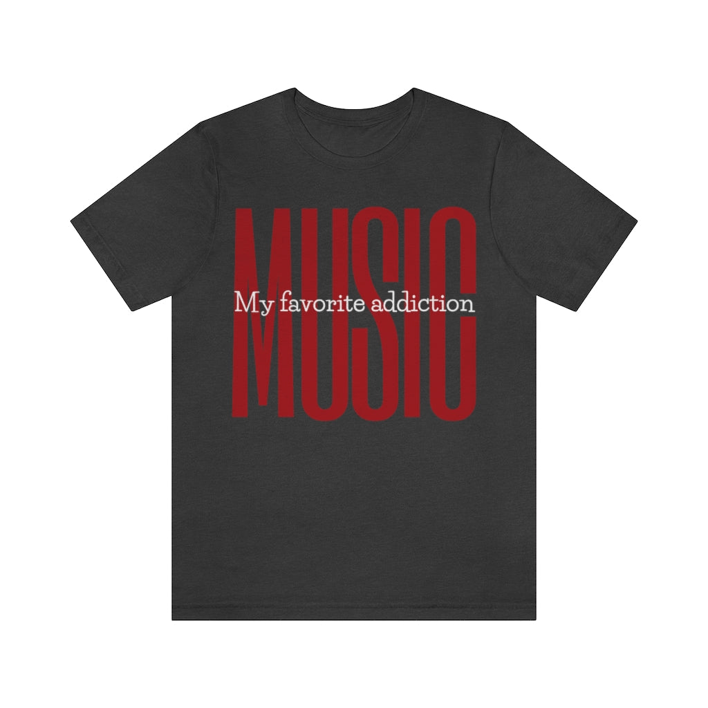 A dark grey A green T-shirt with large red and bold text saying "MUSIC". In the middle of it is the white text "My favorite addiction".