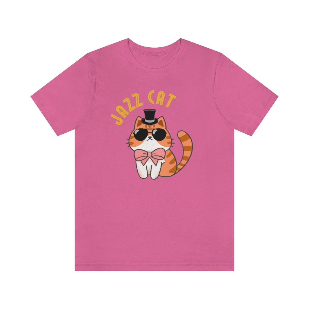 A pink T-shirt with a really cool cat. It's wearing black sunglasses, a top hat and a pink bowtie. Above it is the text "Jazz cat" in a very retro font.