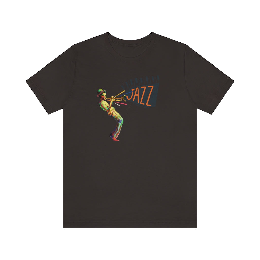 T-shirt with the text "Jazz" coming out from a trumpet players instrument. The trumpet player is colored in vivid colors