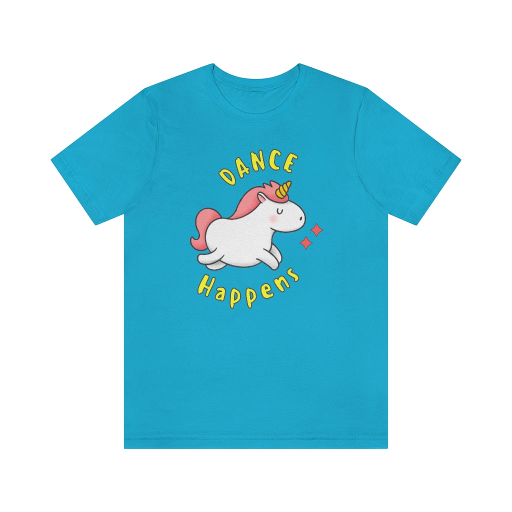 A blue T-shirt with a happy and dancing unicorn with the text "dance happens"