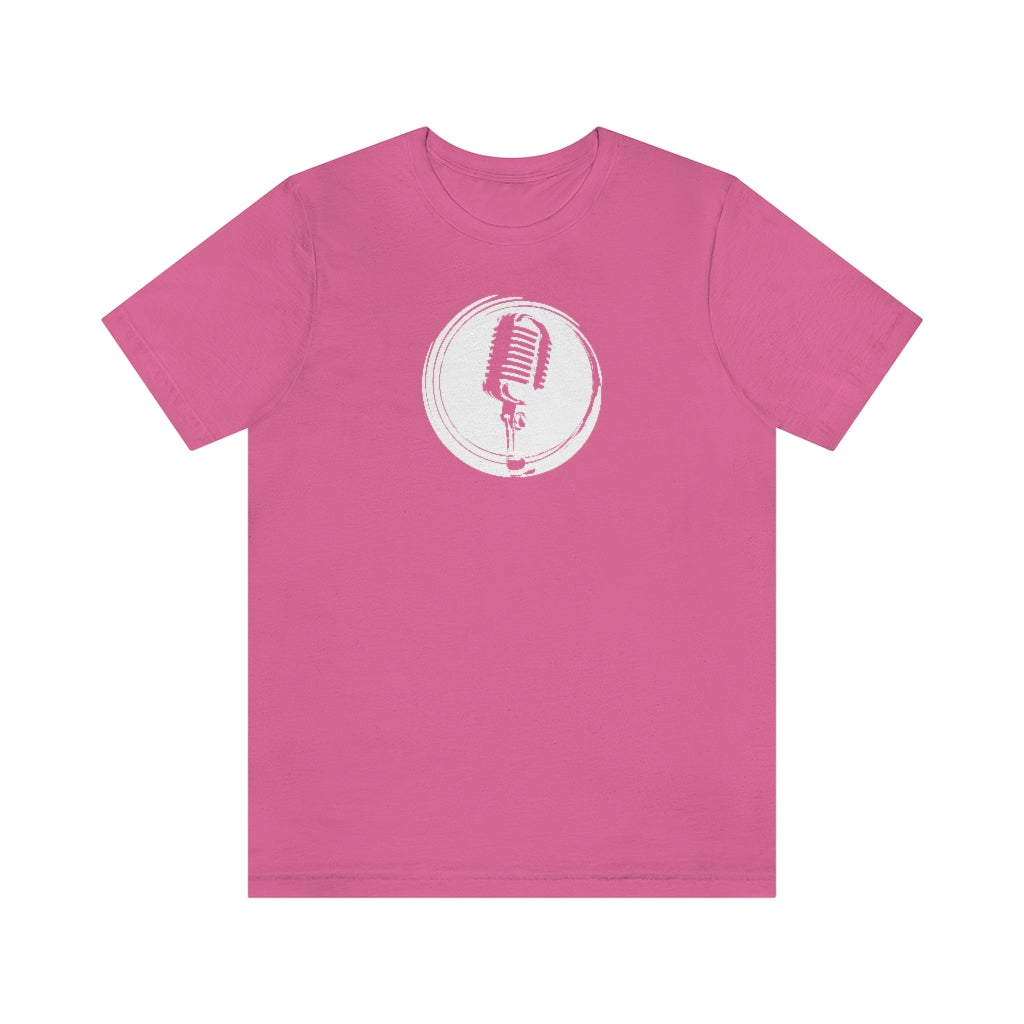 A pink T-shirt with a vintage microphone on a retro stylized circle.