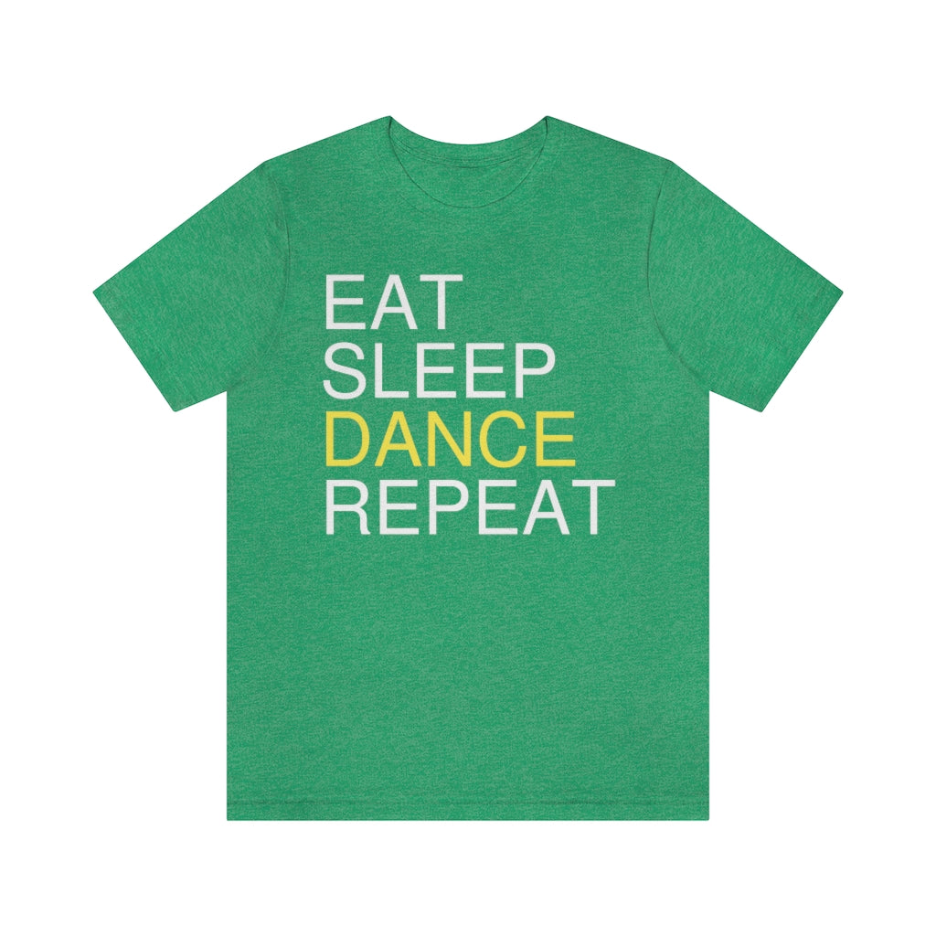 A green T-shirt with the text "eat sleep dance repeat" and the word "dance" is highlighted in yellow.