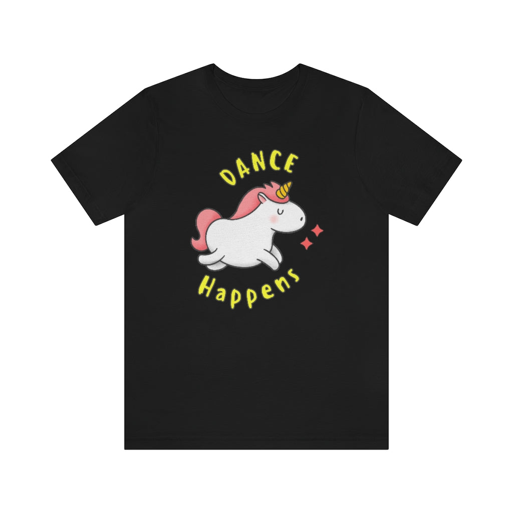 A black T-shirt with a happy and dancing unicorn with the text "dance happens"