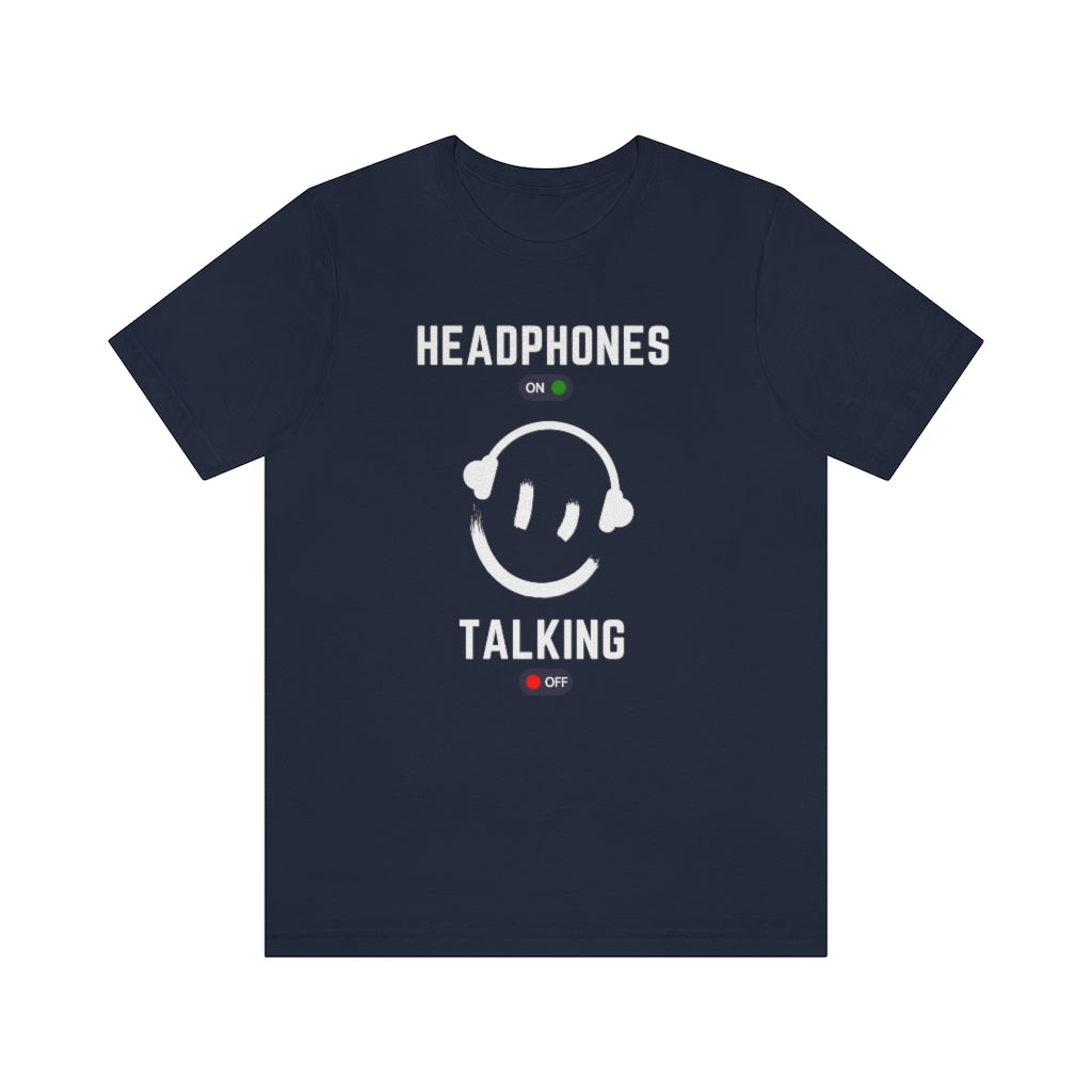 A dark blue T-shirt with a smiley wearing headphones. it has the text "Headphones on talking off" on it.
