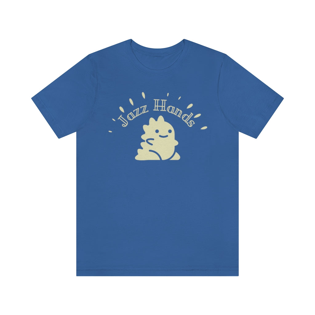 A blue T-shirt with an adorable dinosaur. It is waving its proportionally small hands and doing the most charming form of jazz hands. Above it is the text "Jazz Hands" in a very retro font. 